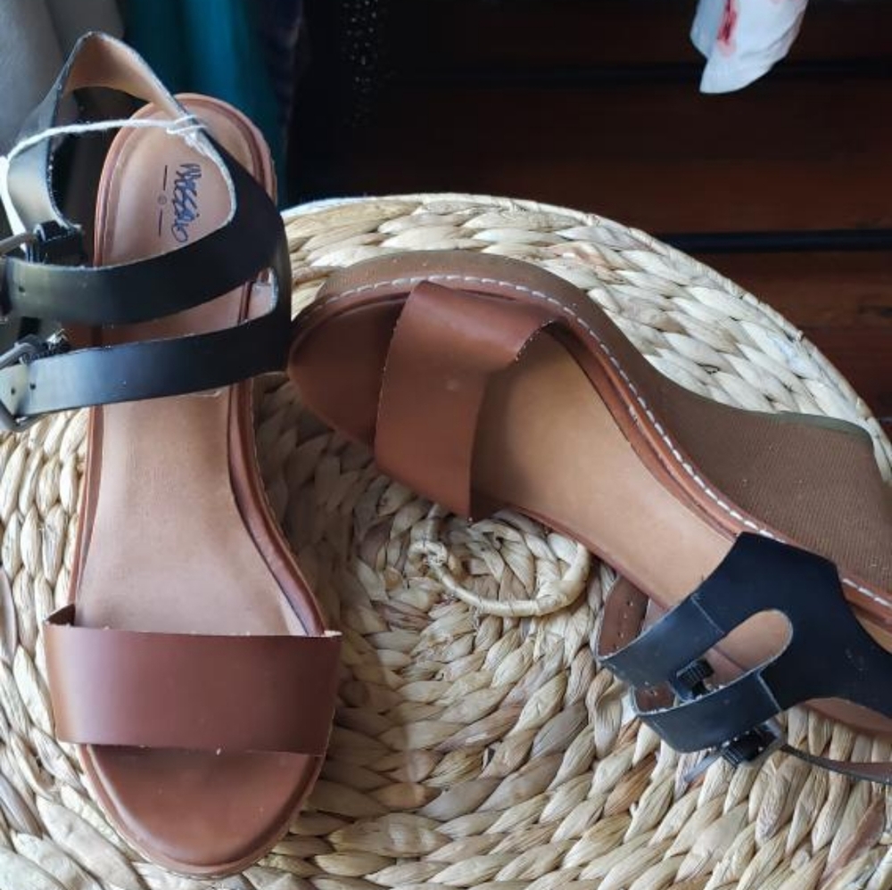 Brown and black faux leather wedges